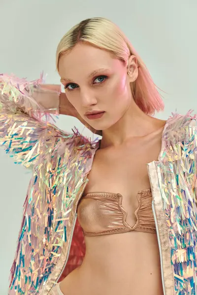 A stylish young woman showcases her unique holographic fashion. — Stock Photo