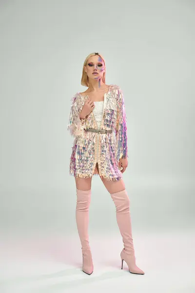 A fashionable young woman showcases modern elegance with holographic elements. — Stock Photo