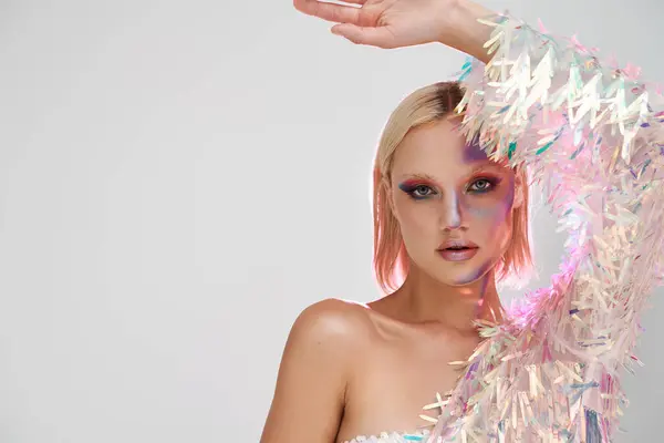 A stylish young woman showcases her unique holographic fashion with confidence. — Stock Photo