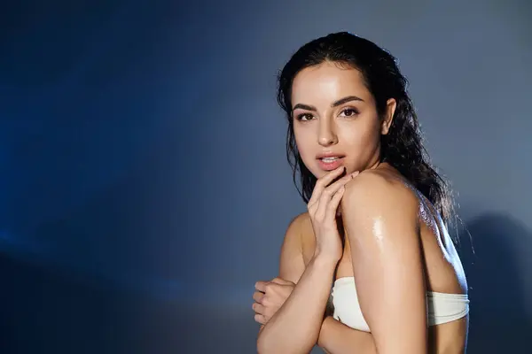 A young woman showcases her skincare routine with confidence and grace. — Stock Photo