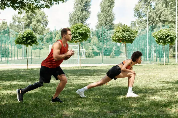 Two friends work out in a park, showcasing strength, determination, and friendship. — Stock Photo