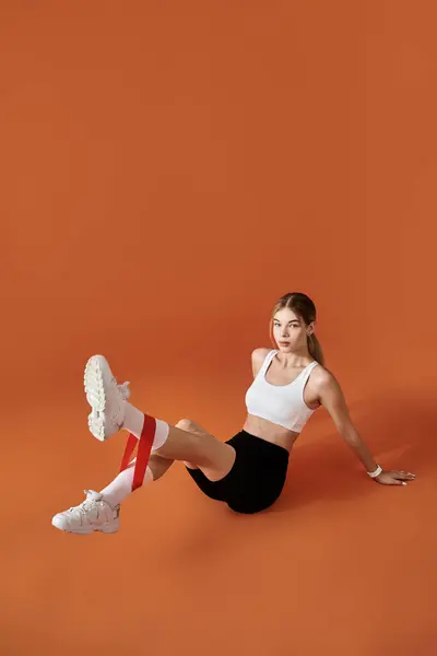 A sportswoman shows passion in her exercises, showcasing her athleticism and determination. — Stock Photo