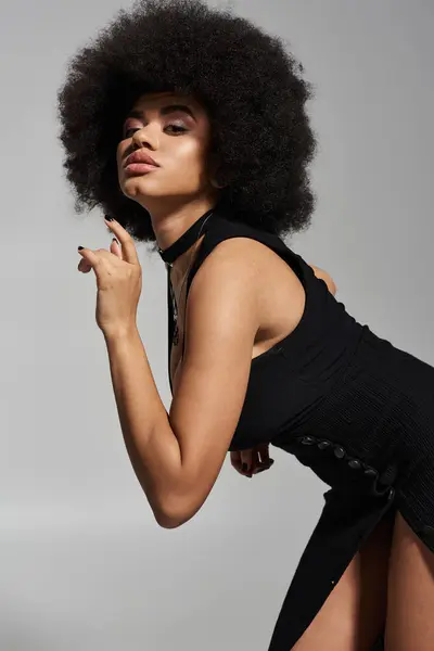 Appealing woman shares a tender embrace, exuding passion and confidence in a chic atmosphere. — Stock Photo