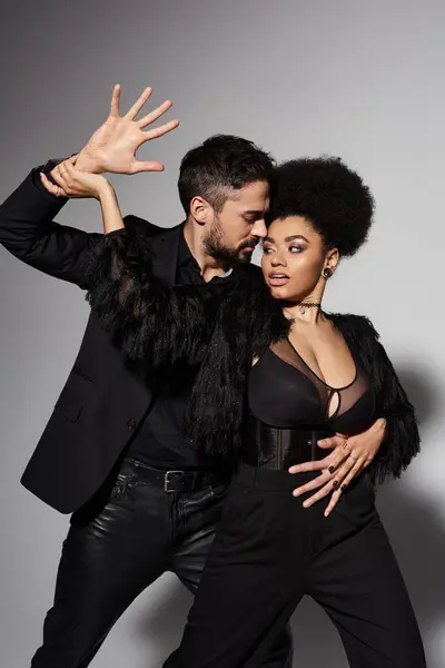 A loving couple engages in a passionate dance, displaying their deep connection and chemistry. — Stock Photo