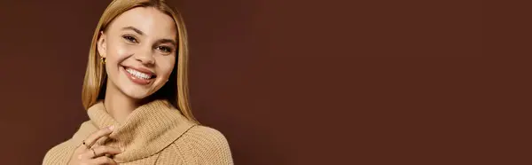 Encanto radiante, una joven muestra la moda otoñal, expresando alegría en su postura. - foto de stock