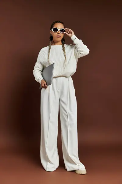 Beautiful woman in elegant warm attire posing actively. — Stock Photo