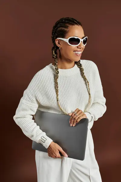 Trendy woman in elegant warm attire posing actively. — Stock Photo