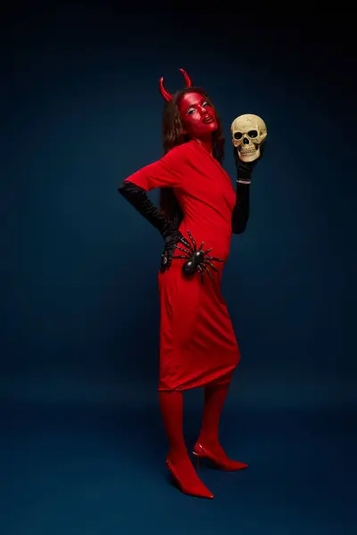This captivating character showcases a creative Halloween ensemble with devilish flair. — Stock Photo