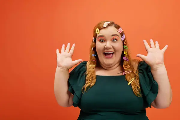 A cheerful plus size woman expresses excitement with playful hair clips adding charm to her look. — Stock Photo