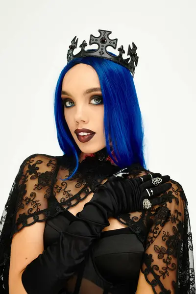 She captivates with a striking Halloween costume, exuding elegance and mystery at the event. — Stock Photo