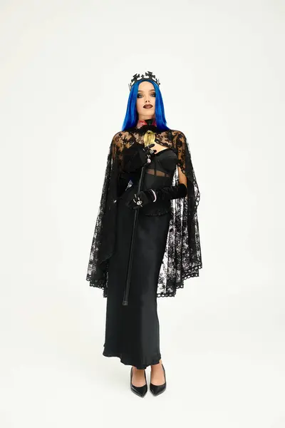 The enchanting woman dons a gothic Halloween costume, exuding elegance and mystery. — Stock Photo
