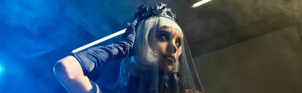 A young woman in a stunning Halloween costume captivates with her charm. — Stock Photo