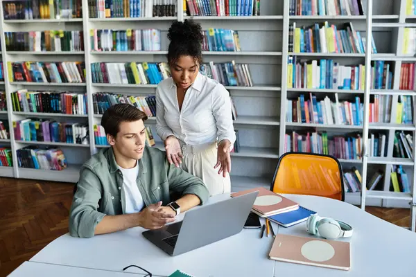 A devoted teacher helps her student grasp concepts in a warm learning space. — Stock Photo