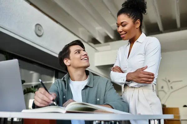 A caring educator engages with her student, fostering a love for learning and curiosity. — Stock Photo