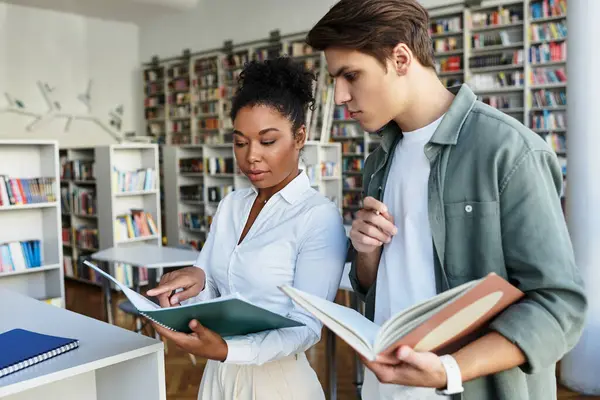 A dedicated teacher passionately explains concepts while her student attentively listens. — Stock Photo