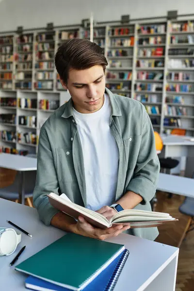Young handsome student studying hard, back to school. — Stock Photo