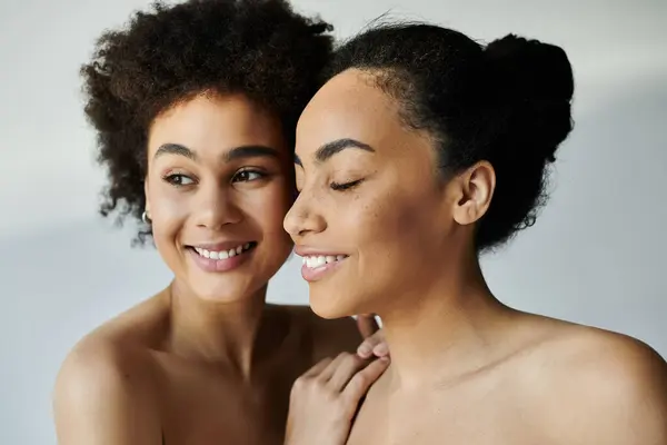 These two women radiate happiness, showcasing their unique beauty and friendship together. — Stock Photo