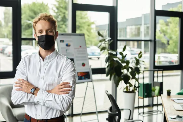 A professional redhead businessman in a white shirt develops ideas in a modern office setting. — Stock Photo
