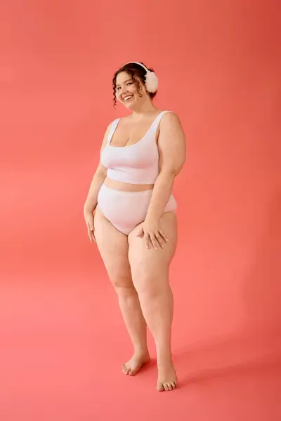 This confident plus size woman radiates beauty and body positivity in an elegant pose. — Stock Photo