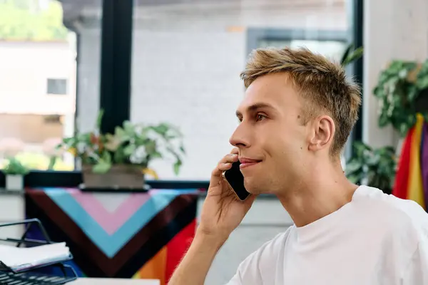 Blonde businessman in casual attire working in office. — Stock Photo