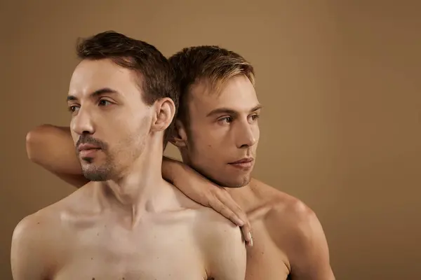 A heartfelt moment shared between two young men, showcasing their intimacy and connection. — Stock Photo