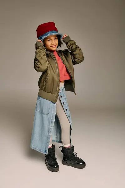 Little girl showcases a festive look filled with holiday cheer, embodying Christmas joy in 2025. — Stock Photo