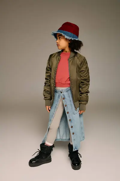 Charming girl dressed for the holiday season in trendy winter wear and a joyful spirit. — Stock Photo