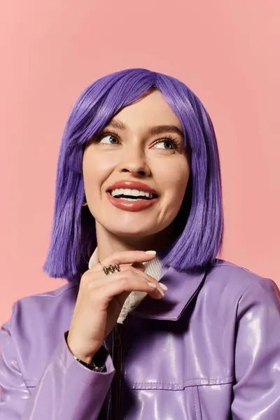 A confident woman with purple hair and a stylish outfit smiles joyfully. — Stock Photo