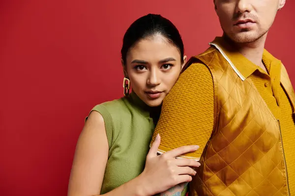A beautiful couple showcases their love in trendy outfits, celebrating Valentines Day together. — Stock Photo