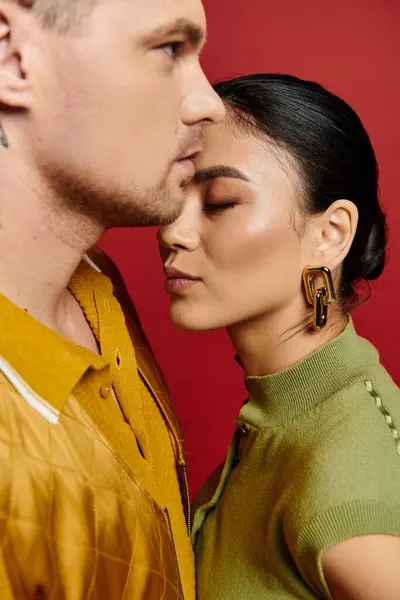 Couple embraces in a warm and stylish studio, celebrating love and connection on Valentines Day. — Stock Photo