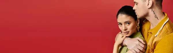 A beautiful couple embraces each other in stylish outfits, radiating romance and joy, banner — Stock Photo