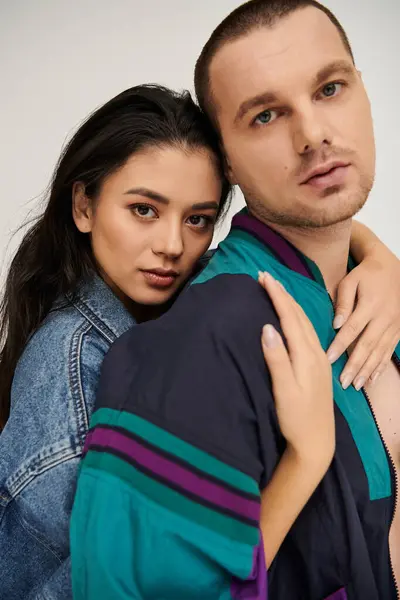 A beautiful couple showcases their love in a trendy studio, perfect for Valentines day. — Stock Photo