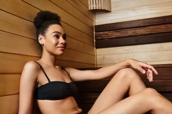 A young chic woman enjoys relaxation in a tranquil spa, embracing wellbeing. — Stock Photo
