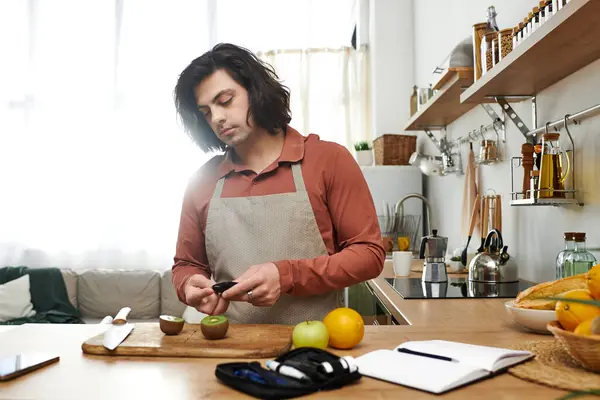 A young man prepares nutritious snacks at his stylish apartment, managing diabetes daily. — Stock Photo