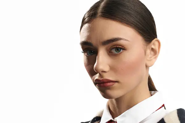 A young woman with striking features expresses deep emotions with her intense gaze. — Stock Photo