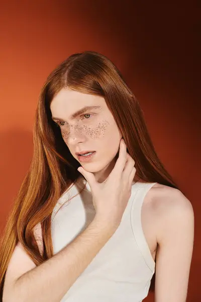 Young individual with striking red hair and freckles poses confidently, radiating style and charm. — Stock Photo