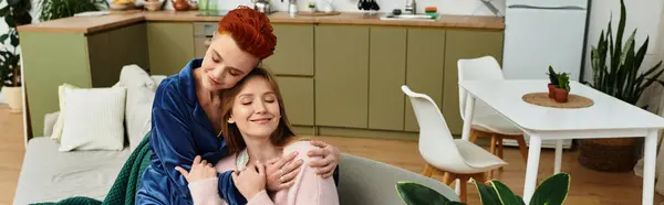 Two beautiful women enjoy a cozy moment together at home, celebrating their love and connection, banner — Stock Photo