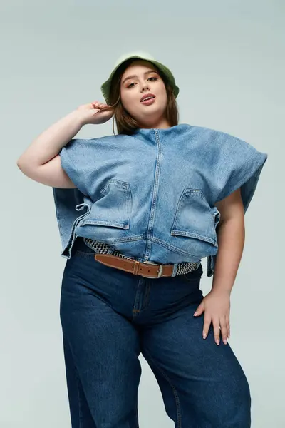Bright backdrop highlights a young woman showcasing her unique fashion sense and radiant energy. — Stock Photo