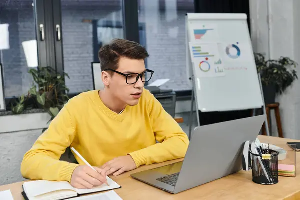A focused individual participates in his first day onboarding at a stylish office environment. — Stock Photo