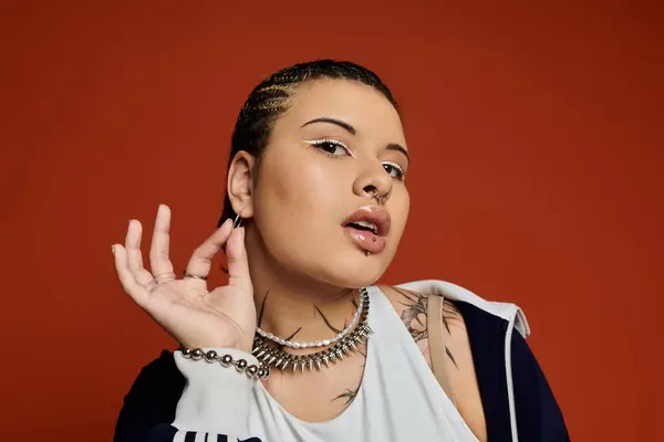 A young woman flaunts her fashion forward style with stylish braids and bold accessories. — Stock Photo