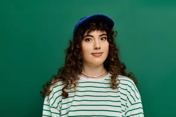 A fashionable young woman captures attention with her unique style and expressive emotion. — Stock Photo
