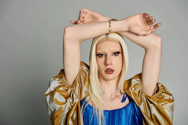 A stylish young drag queen showcases their unique look with confident poses and trendsetting attire. — Stock Photo
