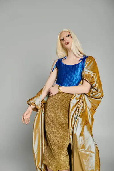 A stylish young drag queen poses, flaunting a unique outfit and vibrant personality. — Stock Photo
