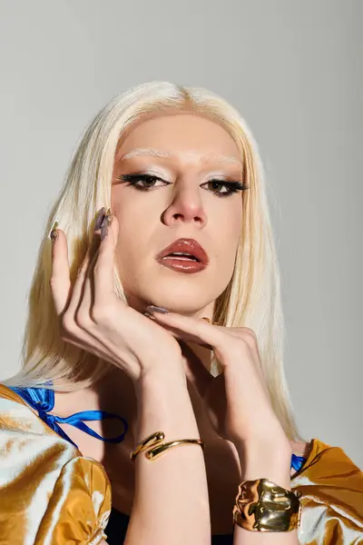 A trendy drag queen poses confidently, showcasing stunning makeup and stylish attire. — Stock Photo
