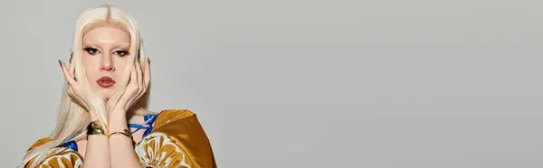 A confident drag queen showcases stunning style and unique personality in a trendy setting. — Stock Photo