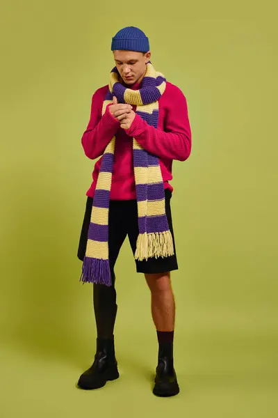 Confident young man showcases stylish outfit, promoting inclusion and diversity in fashion. — Stock Photo