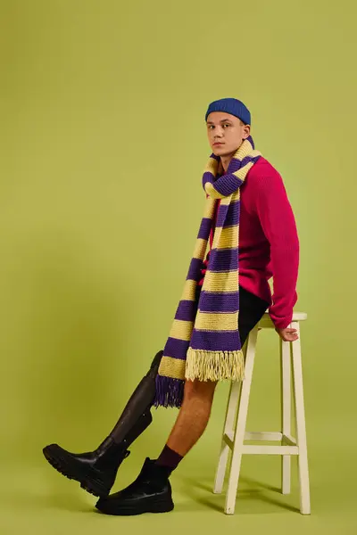 Handsome young man poses confidently in trendy attire, emphasizing inclusion and diversity. — Stock Photo
