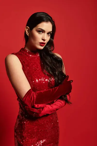 A young woman with brown hair and red lips captivates against a vibrant backdrop. — Stock Photo