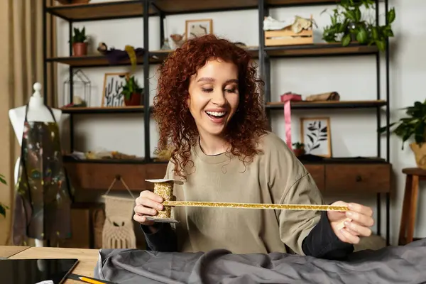 Happy woman crafts with colorful materials in her modern DIY studio during the day. — Stock Photo