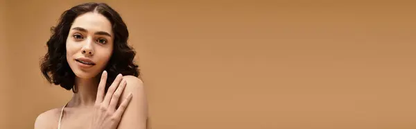 Young woman with braces shares her glowing skincare routine in a chic studio, banner — Stock Photo